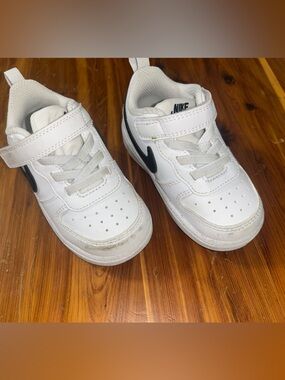Nike Kids White Sneakers with Black Swoosh